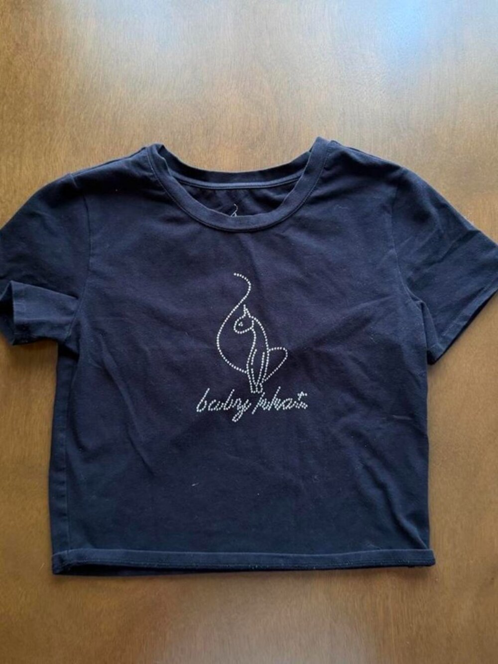 Baby Phat black cropped tee with white outline cat graphic, size S